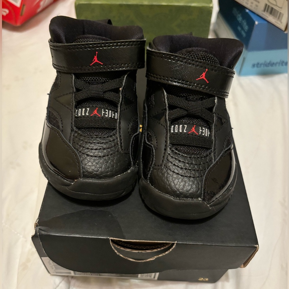 Like new Toddler red and black Jumpman Two Trey Jordan. Size 4c. Comes with box.